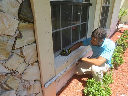 Inspector examining property details during home inspection