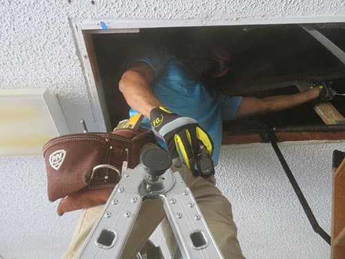 Inspector documenting findings on-site Fort Lauderdale